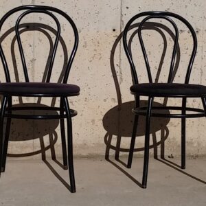 Silla metálica de segunda mano, color negro, en cabauoportunitats.com