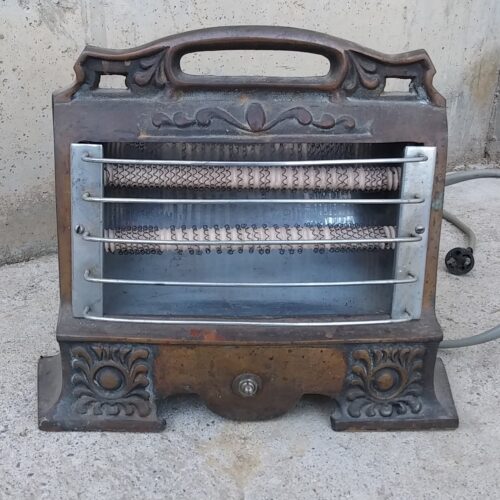 Estufa elèctrica antiga de ferro colat 100% funcional a cabauoportunitats.com