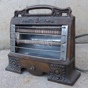 Estufa elèctrica antiga de ferro colat 100% funcional a cabauoportunitats.com