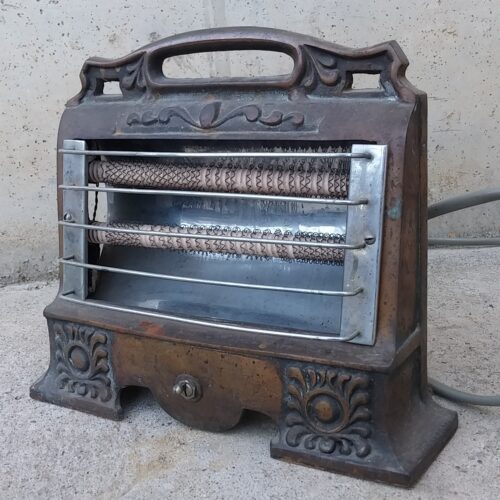Estufa elèctrica antiga de ferro colat 100% funcional a cabauoportunitats.com