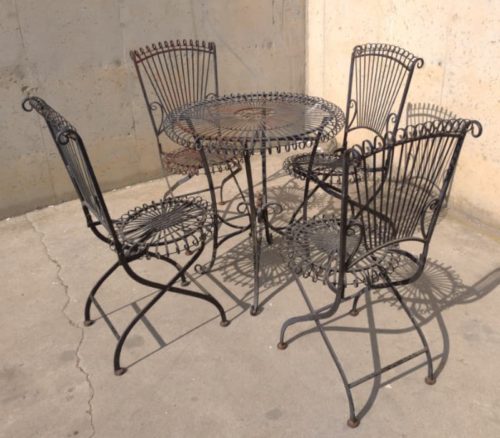 Mesa + 4 sillas estilo forja de ocasión en cabauoportunitats.com