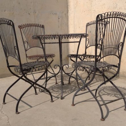 Mesa + 4 sillas estilo forja de ocasión en cabauoportunitats.com