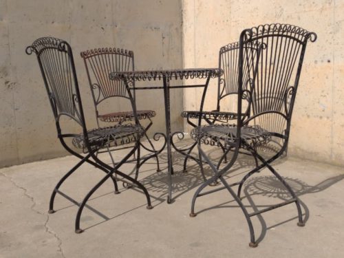 Mesa + 4 sillas estilo forja de ocasión en cabauoportunitats.com