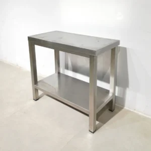 Taula d'acer inoxidable 75x35x85cm de segona mà en bon estat en venda a cabauoportunitats.com