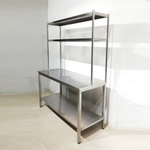 Mesa de acero inoxidable con pasaplatos de 144x64x193 de gunda mano en venta en cabauoportunitats.com