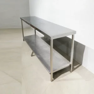 Taula d'acer inoxidable de 200x51x84cm de segona mà en bon estat en venda a cabauoportunitats.com