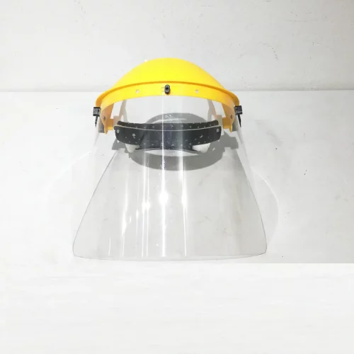 Casco de seguridad con visera transparente procedente de una empresa en cierre