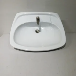 Pica de lavabo amb peu de porcellana de color blanc de segona mà en bon estat