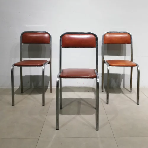 Cadires per a menjador 36x38x82 cm d'estructura metàl·lica i encoixinat marró de segona mà