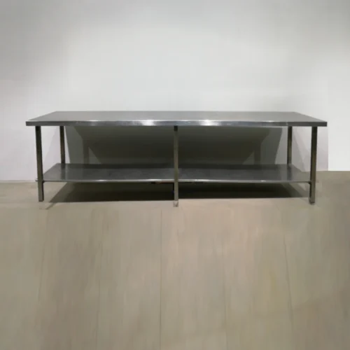 Taula de treball d'inox de 300x70x85cm amb prestatgeria inferior en bon estat