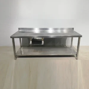 Taula d'acer inoxidable de 200x60x94 cm de segona mà en bon estat