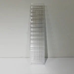 Dispensador de paret (24x13x112cm) fet de plàstic transparent amb 12 compartiments