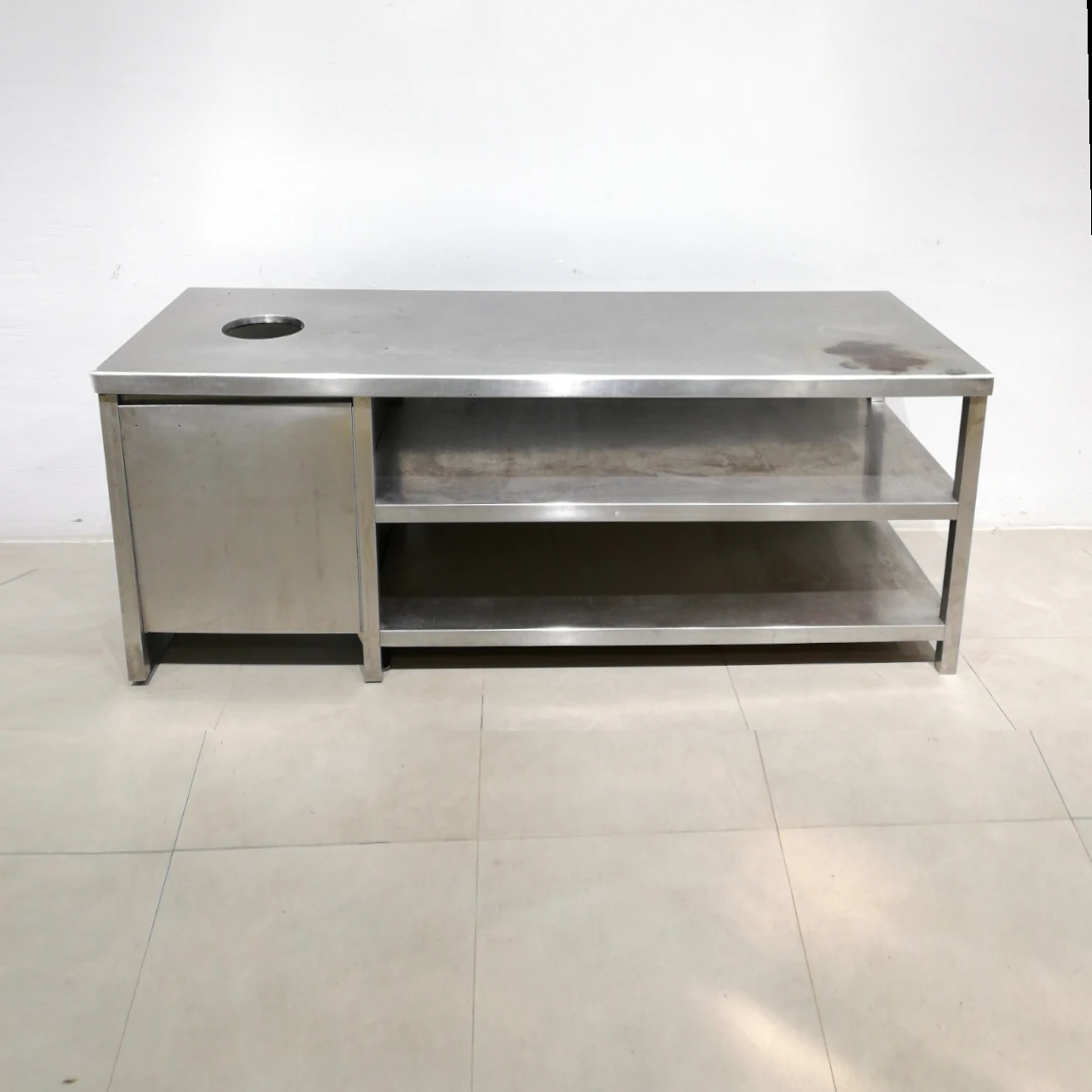 Taula d'acer inoxidable de 200x70x80cm de gran qualitat i resistรจncia en bon estat