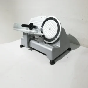 Máquina cortafiambres 46x30x30cm ø20cm procedente de una empresa en cierre