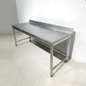 Taula d'acer inoxidable 215x70x95cm procedent d'una empresa en tancament